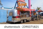 Small photo of Santa Monica, CA, USA - 04 April 2018: Retro street food truck at Pacific Park in Santa Monica Pier, Los Angeles, California