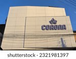 Small photo of June 19, 2023, Talca, Chile: Corina brand logo sign on a modern building on blue sky