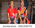 Small photo of Sarawak, Malaysia – October 21, 2021: The photo showing native women or 'ring ladies' of Sarawak. This indigenous ladies wearing the yellow copper rings since they were young.