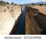 Small photo of The Corinth Canal is an artificial waterway that connects the Gulf of Corinth with the Aegean Sea through the Isthmus of Corinth. Greece 2016