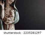 Virgin Mary Holding Baby Jesus...