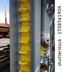 Small photo of Lifting lugs with 10T safe working load (SWL) for deck tie-down stacked at portside of a construction vessel