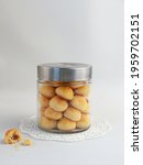 Small photo of Nastar Cookies, Pineapple tarts or nanas tart are small, bite-size pastries filled or topped with pineapple jam, commonly found when Hari Raya or Eid Al Fitr or Lebaran. Selective focus.