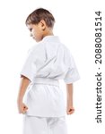 Small photo of Little boy martial art sportsman posing isolated over white background. Concept of martial art, healthy lifestyle, sport, action, combat sport, energy, fit. Copy space for ad