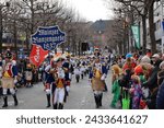 Small photo of Mainz, Germany - February 10, 2024: Traditionally, every year at 14.11 at the carnival season is opened in Mainz by shouting 3x "Helau" and celebrating on the streets with kids, Der Jugendmaskenzug.