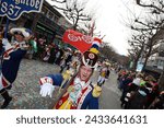 Small photo of Mainz, Germany - February 10, 2024: Traditionally, every year at 14.11 at the carnival season is opened in Mainz by shouting 3x "Helau" and celebrating on the streets with kids, Der Jugendmaskenzug.