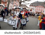 Small photo of Mainz, Germany - February 11, 2024: Traditionally, shouting 3x "Helau" and celebrating on the streets with kids, MTV-Guggemusik-Festival am Fastnachtsonntag.