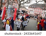 Small photo of Mainz, Germany - February 11, 2024: Traditionally, shouting 3x "Helau" and celebrating on the streets with kids, MTV-Guggemusik-Festival am Fastnachtsonntag.