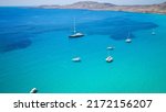 Small photo of Beautiful photo with sea, a few boats and mountain, the photo taken yesterday 26.06.2022 in Greece elafonisos, beautiful colour blue and green sea in Greece with waves
