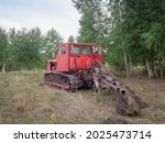 Old Tractor In The Forest. The...