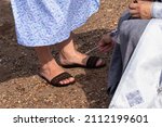 Small photo of The priest performs the sacrament of unction (chrismation).