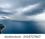 Small photo of Downpour Cloudburst heads towards the coast