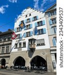 Small photo of Zurich, Switzerland - July 20, 2023: Guild house zur Haue on Limmat embankment