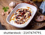 Small photo of Traditional Turkish and Greek Meze with chili peppers. Turkish Appetizer Atom with yogurt. Turkish atom meze