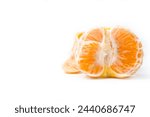 Small photo of peeled tangerines on a light background macro photography. peeled tangerine close-up. tangerine without peel.