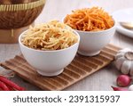 Small photo of French fries sliced the size of matchsticks, dry fried, usually some are savory and some are spicy
