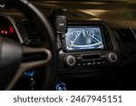 Safety technology equipment. Parking car using auxiliary parking system using the built-in monitor in the dashboard. Rear view monitor for the car