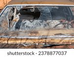 When I first saw this car, my eyes looked at the abstract image possibilities. Then I saw what had really happened. Car accident. Passenger went through windshield. Wear your seatbelt. Be safe.