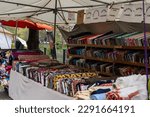 Small photo of Berlin Neukolln 2023: The weekly market on Maybachufer offers fresh fruit and vegetables, fish, cheese, street food from many countries, flowers and stalls with fabrics and bric-a-brac.