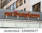 Small photo of Berlin Germany April 10, 2023: Zur Bratpfanne is a popular currywurst joint on Schlosstrase that has been around since 1949.