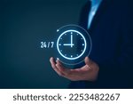 nonstop service concept. businessman show virtual 24-7 with clock for worldwide nonstop and full-time available contact of customer service concept. digital online customer service on internet network