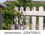Wooden Gate In The Hedge...