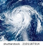 Small photo of Aerial view of Super Typhoon Hagibis, Spinning in the western Pacific Ocean, typhoon grew from a tropical storm to category 5 storm, Northern Mariana Islands. Elements of this image furnished by NASA