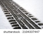 Track Of A Car Tire On The Snow ...