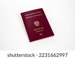 Small photo of Official passport of Austria on white background, Text saying" Europeam Union, Republic of Austria, Passport