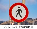 Pedestrian Safety: Round Road Sign Prohibiting Foot Traffic