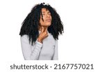 Small photo of Young african american girl wearing casual clothes touching painful neck, sore throat for flu, clod and infection