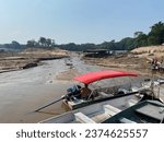 Small photo of Manaus Amazonas, Brazil 09.29.2023 Dried out affluent to the river Rio Negro in Marina do Davi