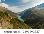 Beautiful green and blue lake at Kölnbrein Dam, a dam in Kärnten, Carinthia, Austria
