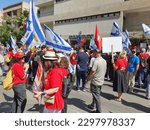 Small photo of Tel Aviv, Israel - May 4, 2023: Demonstrators rallied in front of The Rabbinical Court, 33 King David Boulevard, protesting against the judicial reform. Star of David icon.