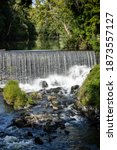 Small photo of Hidden in plain site: this is a slow shutter portrait of a waterfall in Beacon, NY, off of the main drag.