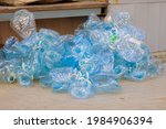 A pile of rubbish from unusable crumpled plastic bottles.