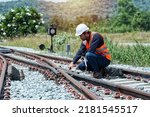 engineer Sitting on railway inspection. construction worker on railways. Engineer work on railway.rail,engineer,Infrastructure