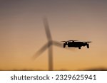 Captivating Silhouette of a UAV, Embracing the Modern Era of Aerial Exploration.  Silhouette of a UAV Soaring through the Skies.