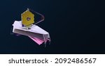 Small photo of James Webb space telescope isoalted on dark gradient background. Astronomy and research of deep space. Sci-fi concept. Elemets of this image furnished by NASA