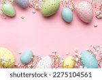 Happy Easter holiday greeting card. Bouquet of white tulips and Easter egg on pink background. Space for text