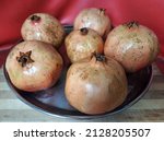 Small photo of Fresh Pomegranate in the plets beautiful colours,September,21,2021:saudi arabia.