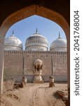 Small photo of View of the back of mughal style white marble Abbasi mosque outside Derawar fort in the Cholistan desert, Bahawalpur, Punjab, Pakistan