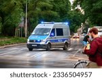 Small photo of 07.23.2023 wroclaw, poland, Police car of the traffic police while driving on the signal to a traffic accident. Accidental link.