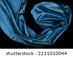 Small photo of Fabric drapery backdrop abstract background. Shapeless empty surface. luxury metallic elegance blue, cyan, aquamarine color brocade texture with folds. Сopy space for design