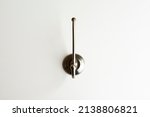 Wall stainless steel hook on white background isolated