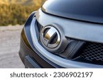 Small photo of Swat, Pakistan - May 19 2023: Nissan Juke Impul logo closeup with selective focus