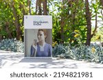 Small photo of Setif, Algeria - August 24, 2022: Close up of Vladimir Nabokov's King, Queen, Knave Novel in The Garden.