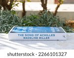 Small photo of Setif, Algeria - February 22, 2023: Close up Madeline Miller's The Song of Achilles novel in the garden.