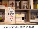Small photo of Setif, Algeria - April 04, 2023: Close up The English Journalist Jojo Moyes's After You novel in the bookshop.
