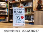 Small photo of Setif, Algeria - May 20, 2023: Close up Charles Duhigg's The Power of Habit book in the bookshop. Self-help book.
